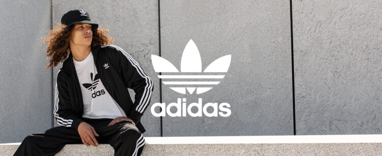 Adidas shoes and apparel representing the brand's evolution.