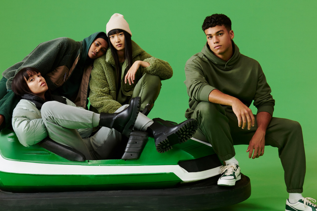 "Pull&Bear UK 2025 fashion collection with models showcasing modern streetwear, denim, and youth-focused apparel in a colorful studio setting."